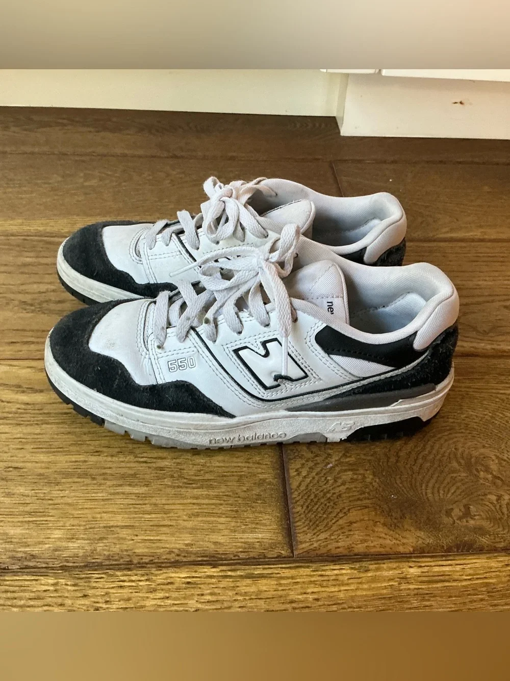 New Balance 550 White and Black Retro Sneakers